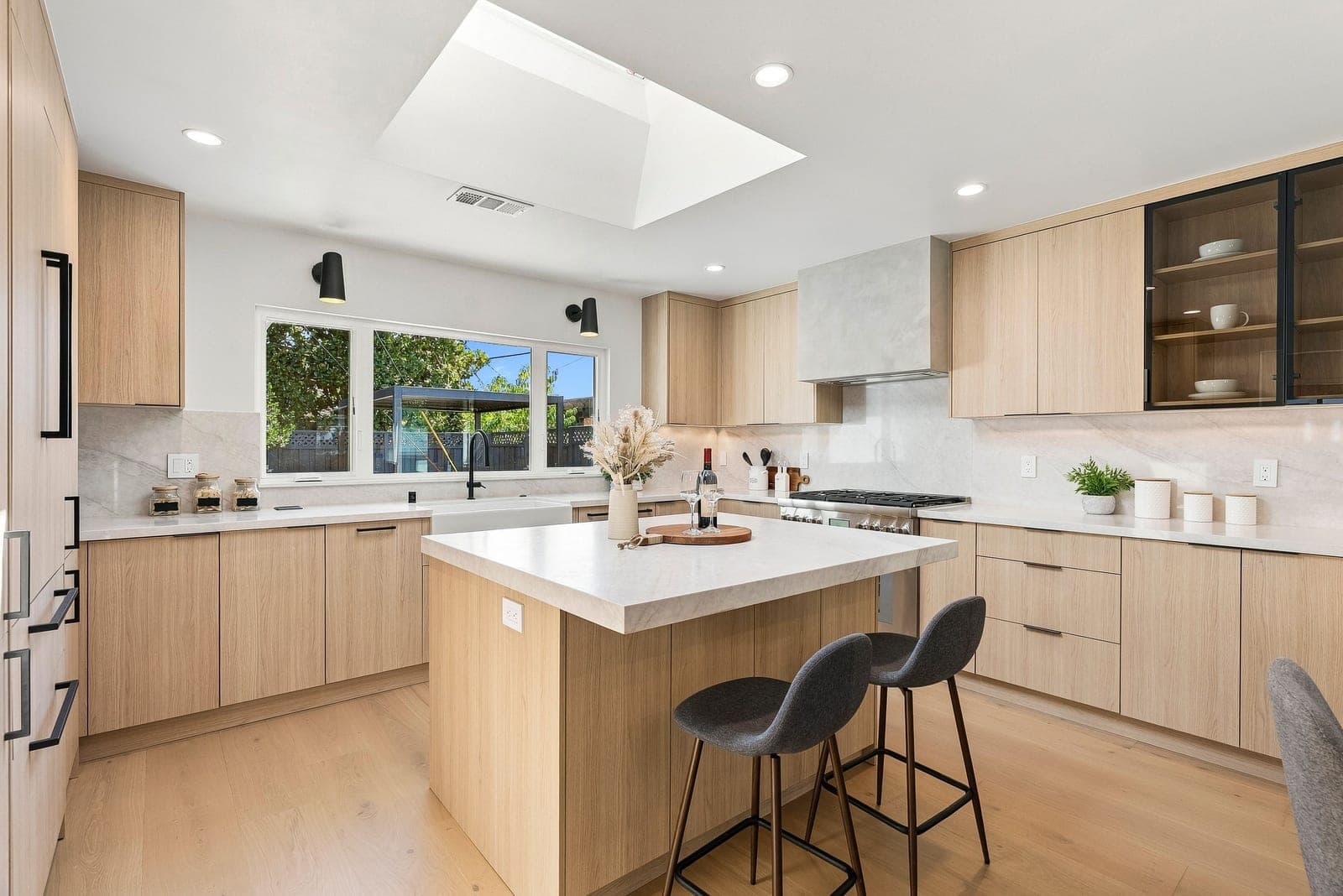 Kitchen with a quartz island and skylight at 1600 Don Court